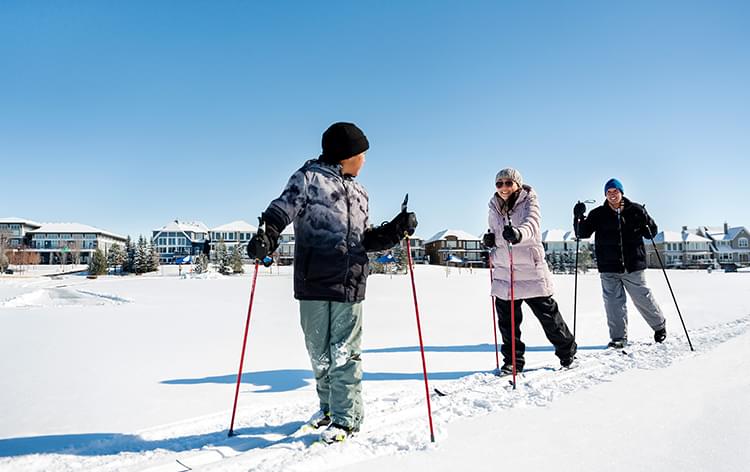 Family on ski path