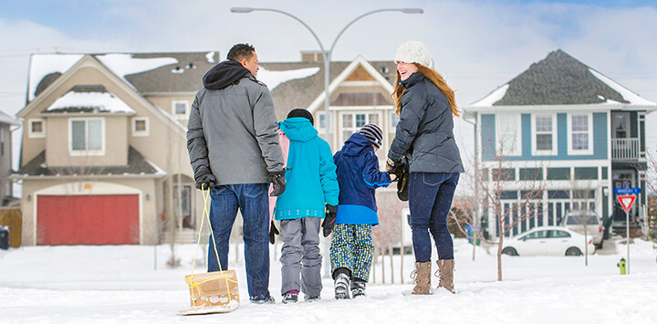 Family walking home from tobogganing