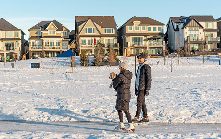 Couple skating on pathway in Mahogany