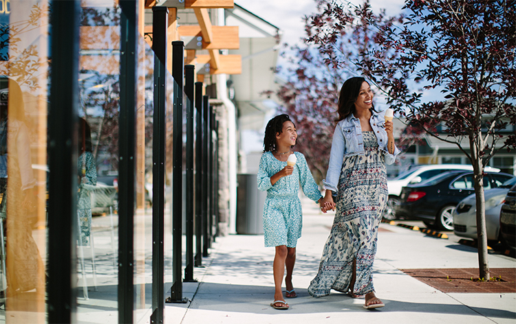 Mother and daughter having ice cream