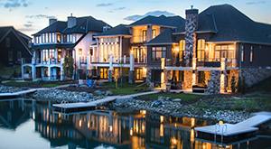Evening view of Lakefront Estate show homes on Mahogany Lake